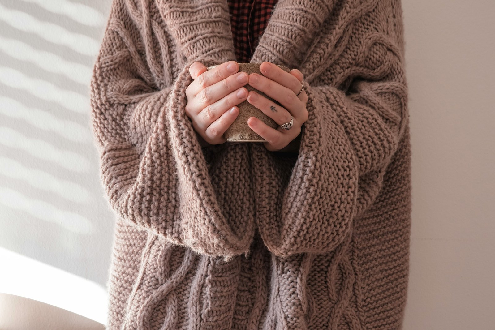Fleck auf Pullover